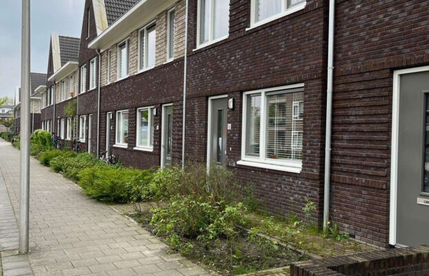 Burenkorting schilderwerk 8 woningen op rij!